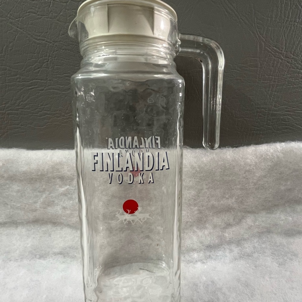 Vintage Finlandia Vodka Glass Pitcher is a must-have for any collector, w/ lid
